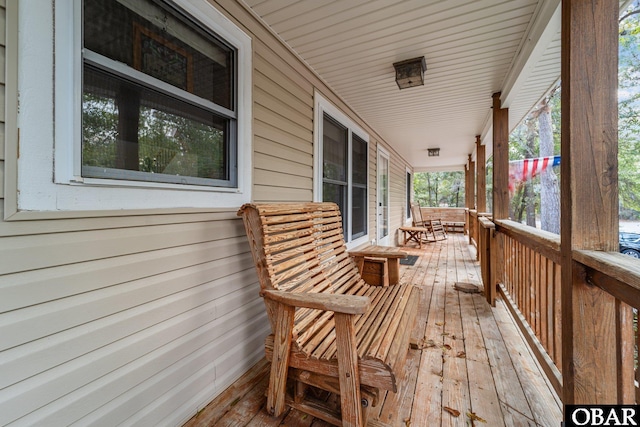 deck featuring covered porch