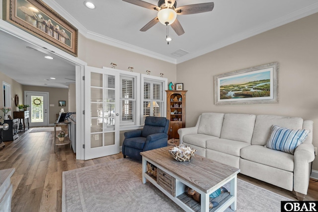 126 W Waterside Ln Lot 25, Nags Head, NC 27959 - living room with crown molding, french doors, wood finished floors, ceiling fan, and recessed lighting
