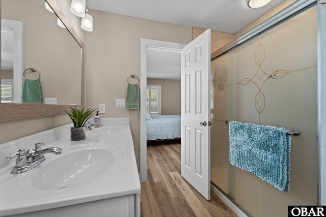 126 W Waterside Ln Lot 25, Nags Head, NC 27959 - ensuite bathroom with double vanity, wood finished floors, and a stall shower