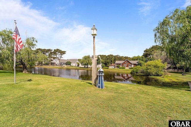 126 W Waterside Ln Lot 25, Nags Head, NC 27959 - view of green lawn featuring a water view and a residential view