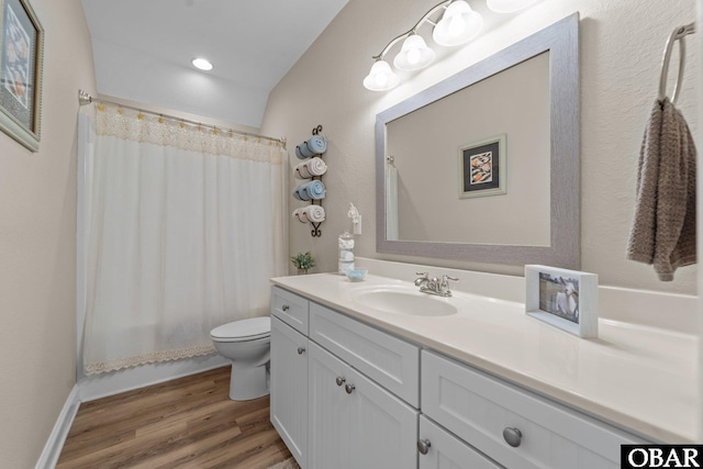 126 W Waterside Ln Lot 25, Nags Head, NC 27959 - full bathroom featuring toilet, vanity, wood finished floors, and shower / tub combo