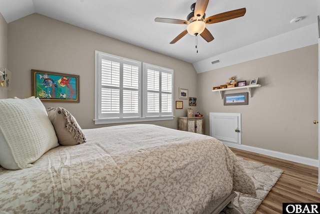 126 W Waterside Ln Lot 25, Nags Head, NC 27959 - bedroom featuring vaulted ceiling, baseboards, wood finished floors, and a ceiling fan