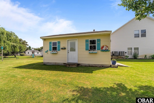 126 W Waterside Ln Lot 25, Nags Head, NC 27959 - rear view of house with a lawn