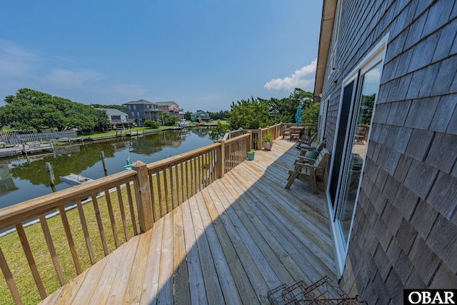50084 Freebooter Ct Lot 177, Frisco, NC 27936 - wooden terrace featuring a water view