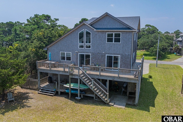 50084 Freebooter Ct Lot 177, Frisco, NC 27936 - rear view of property featuring a wooden deck, stairway, and a lawn