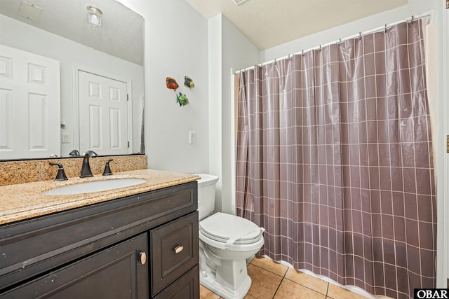 4939 S Virginia Dare Trl Lot 4, Nags Head, NC 27959 - full bathroom with toilet, tile patterned flooring, vanity, and a shower with shower curtain