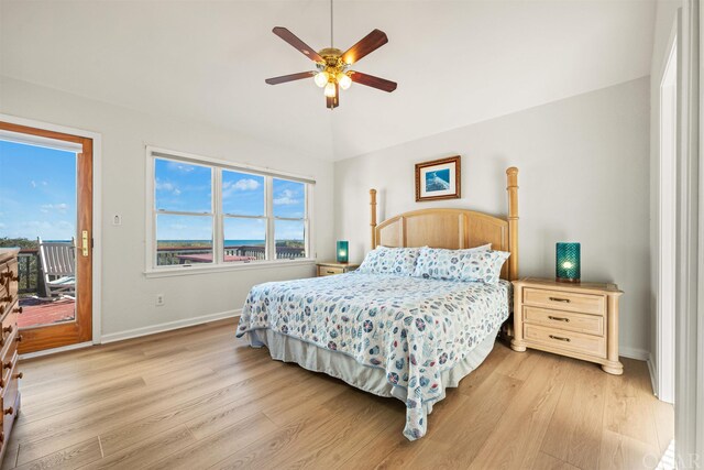 bedroom featuring baseboards, a ceiling fan, lofted ceiling, light wood-style flooring, and access to exterior