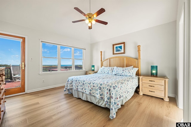 4939 S Virginia Dare Trl Lot 4, Nags Head, NC 27959 - bedroom featuring access to exterior, light wood-style flooring, baseboards, multiple windows, and vaulted ceiling