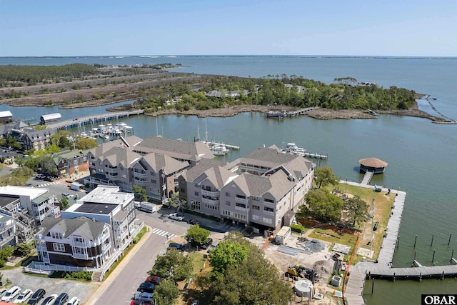 aerial view featuring a water view and a residential view