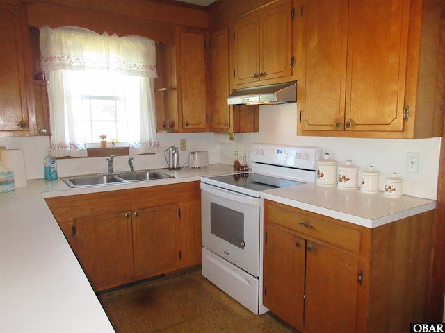 kitchen featuring under cabinet range hood, a sink, electric stove, light countertops, and brown cabinetry