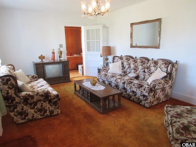 carpeted living room featuring baseboards and an inviting chandelier