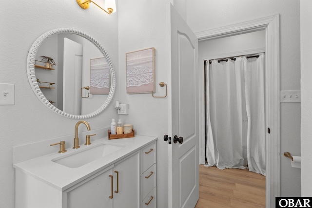 37 Foxwood Cir Lot # 33, Southern Shores, NC 27949 - bathroom featuring wood finished floors and vanity