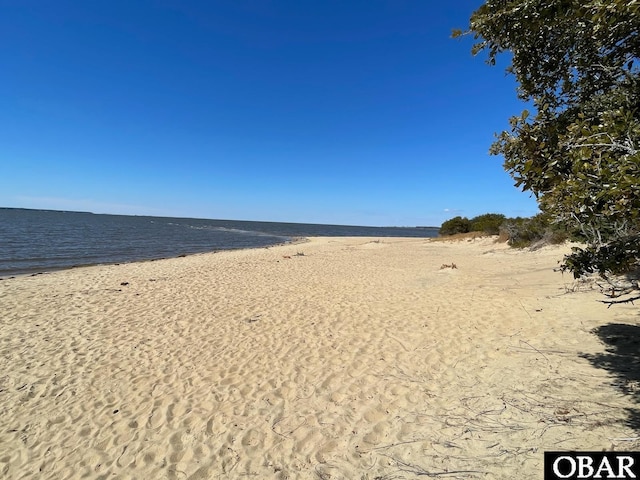 property view of water with a beach view