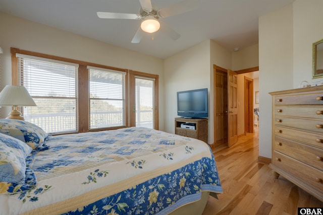 bedroom featuring a closet, a ceiling fan, and light wood-type flooring