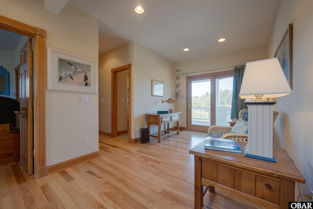 interior space featuring recessed lighting, baseboards, and light wood-type flooring