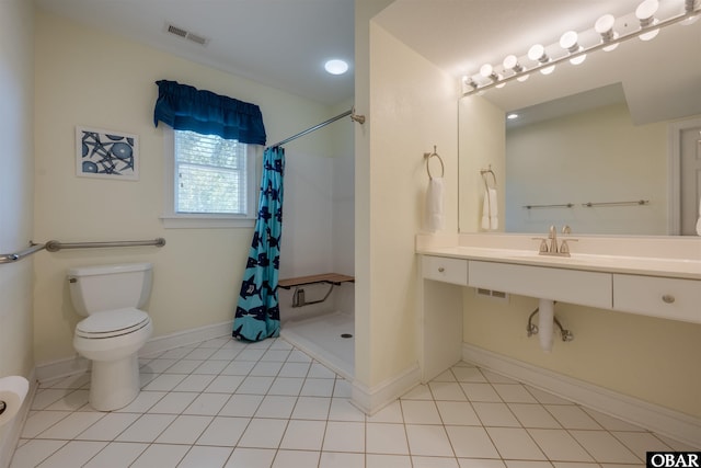 1278 Bear Foot Path Lot 250, Corolla, NC 27927 - bathroom with toilet, a shower stall, baseboards, and a sink