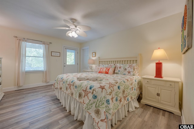 1278 Bear Foot Path Lot 250, Corolla, NC 27927 - bedroom with light wood-style flooring, a ceiling fan, and baseboards