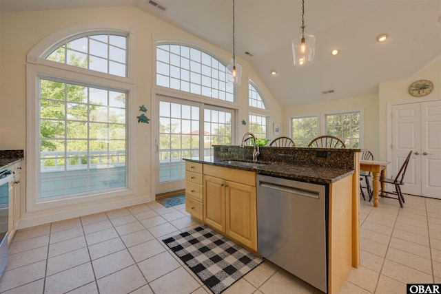 1278 Bear Foot Path Lot 250, Corolla, NC 27927 - kitchen featuring stainless steel dishwasher, a sink, vaulted ceiling, light brown cabinetry, and light tile patterned flooring