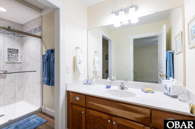 830 Hunt Club Dr Lot 387R, Corolla, NC 27927 - bathroom with vanity, baseboards, a shower stall, and wood finished floors