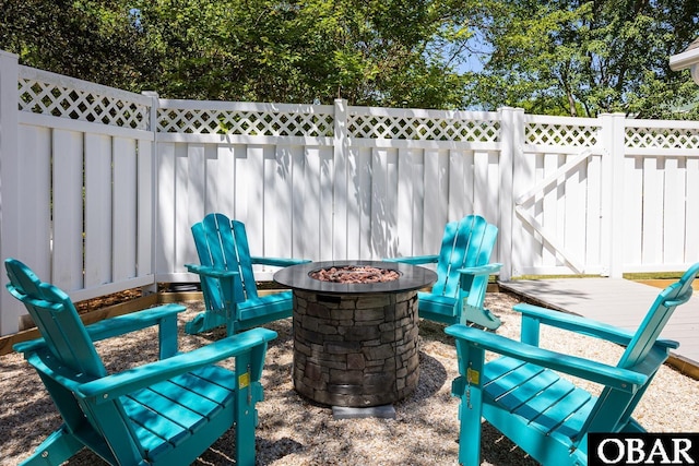 830 Hunt Club Dr Lot 387R, Corolla, NC 27927 - view of patio with a fire pit and fence