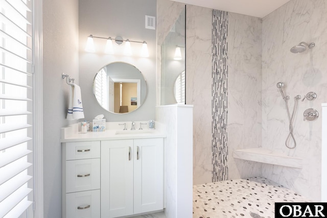 830 Hunt Club Dr Lot 387R, Corolla, NC 27927 - bathroom featuring a walk in shower, vanity, and visible vents