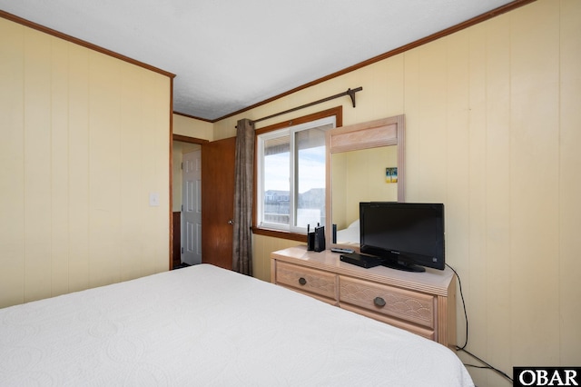 bedroom with ornamental molding