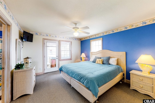 25224 Mac Oca Dr Lot 24, Waves, NC 27982 - carpeted bedroom with ceiling fan and access to exterior