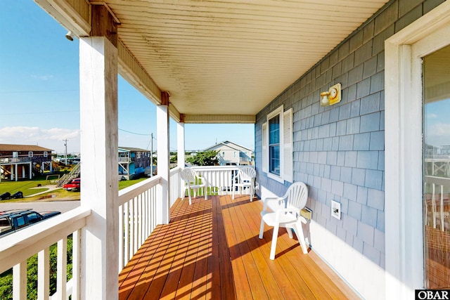 25224 Mac Oca Dr Lot 24, Waves, NC 27982 - wooden deck featuring a residential view