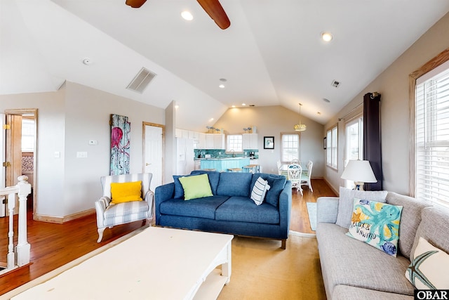 25224 Mac Oca Dr Lot 24, Waves, NC 27982 - living room with lofted ceiling, light wood finished floors, ceiling fan, and plenty of natural light