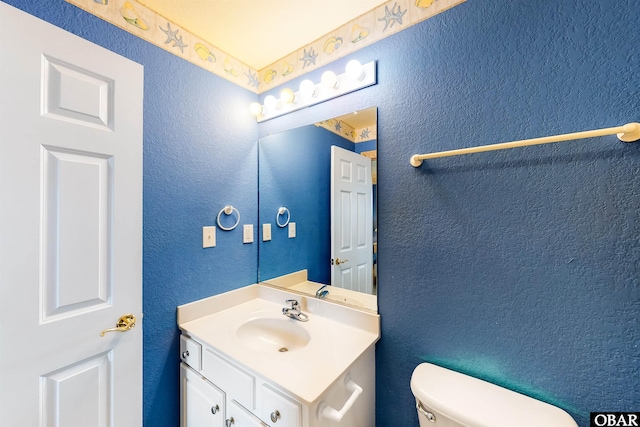25224 Mac Oca Dr Lot 24, Waves, NC 27982 - bathroom with vanity and a textured wall