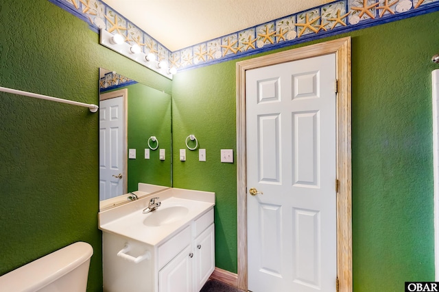 25224 Mac Oca Dr Lot 24, Waves, NC 27982 - half bathroom with vanity and a textured wall