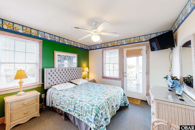 25224 Mac Oca Dr Lot 24, Waves, NC 27982 - carpeted bedroom featuring access to exterior and ceiling fan