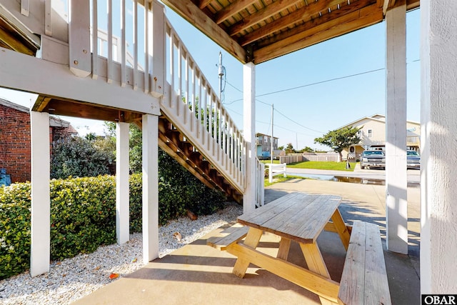 25224 Mac Oca Dr Lot 24, Waves, NC 27982 - view of patio / terrace featuring stairway