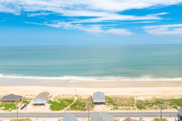 property view of water featuring a beach view