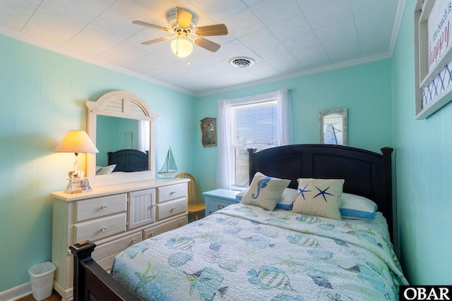 bedroom with visible vents, a ceiling fan, and ornamental molding