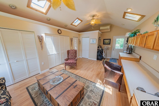 118 Neversail Way Lot 17, Coinjock, NC 27923 - living room with a skylight, ceiling fan, lofted ceiling, light wood finished floors, and ornamental molding
