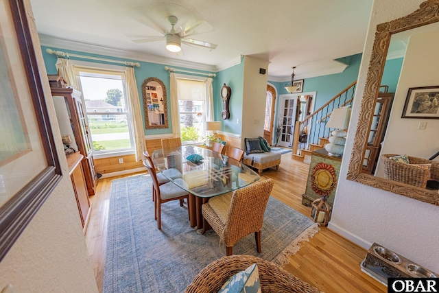 118 Neversail Way Lot 17, Coinjock, NC 27923 - dining area featuring light wood finished floors, stairway, wainscoting, crown molding, and a ceiling fan
