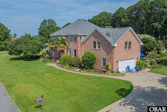 118 Neversail Way Lot 17, Coinjock, NC 27923 - view of front of home with brick siding, a garage, driveway, and a front yard