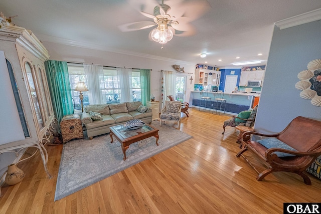 118 Neversail Way Lot 17, Coinjock, NC 27923 - living area featuring ornamental molding, a ceiling fan, and light wood finished floors