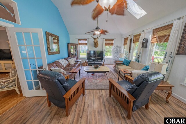 118 Neversail Way Lot 17, Coinjock, NC 27923 - living room with a ceiling fan, wood finished floors, high vaulted ceiling, and a skylight