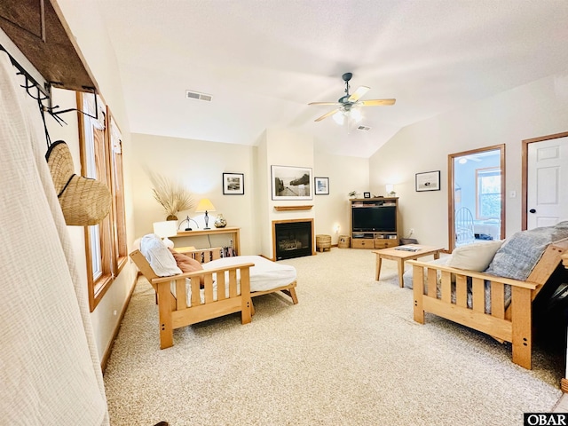 2018 Sea Horse Rd Lot # 67, Corolla, NC 27927 - carpeted living area with ceiling fan, lofted ceiling, and a fireplace