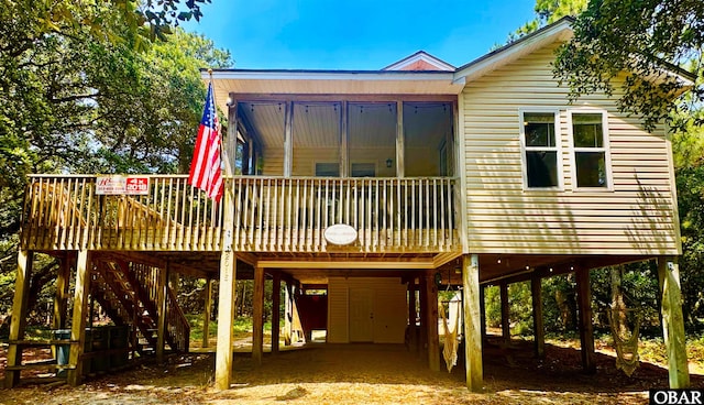 2018 Sea Horse Rd Lot # 67, Corolla, NC 27927 - view of front of house with a carport and a wooden deck