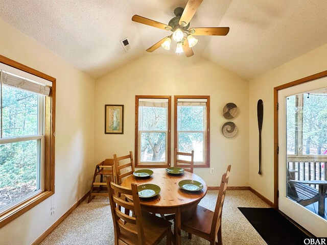 2018 Sea Horse Rd Lot # 67, Corolla, NC 27927 - dining space featuring light carpet, a ceiling fan, a textured ceiling, and lofted ceiling