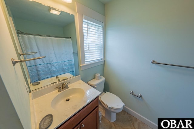 26223A Bluebeard Rd Lot 88, Salvo, NC 27972 - bathroom featuring toilet, vanity, baseboards, and a shower with curtain