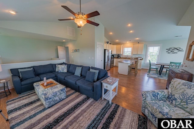 26223A Bluebeard Rd Lot 88, Salvo, NC 27972 - living area with a ceiling fan, wood finished floors, high vaulted ceiling, and recessed lighting