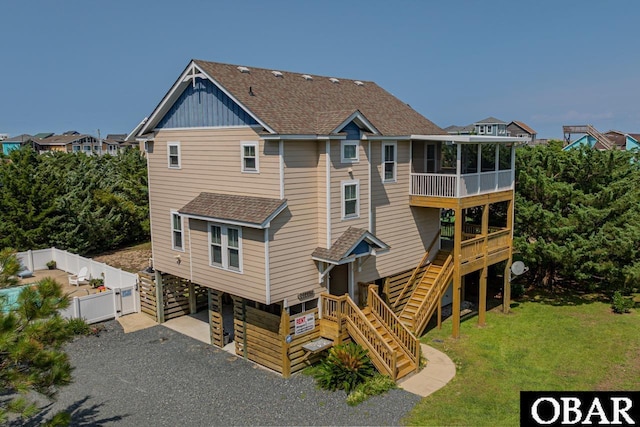 26223A Bluebeard Rd Lot 88, Salvo, NC 27972 - back of house featuring stairs, a carport, a shingled roof, and driveway