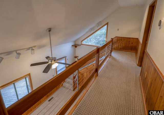 50078 Live Oak Ln Lot # 2, Frisco, NC 27936 - corridor featuring lofted ceiling, visible vents, light carpet, wainscoting, and wood walls