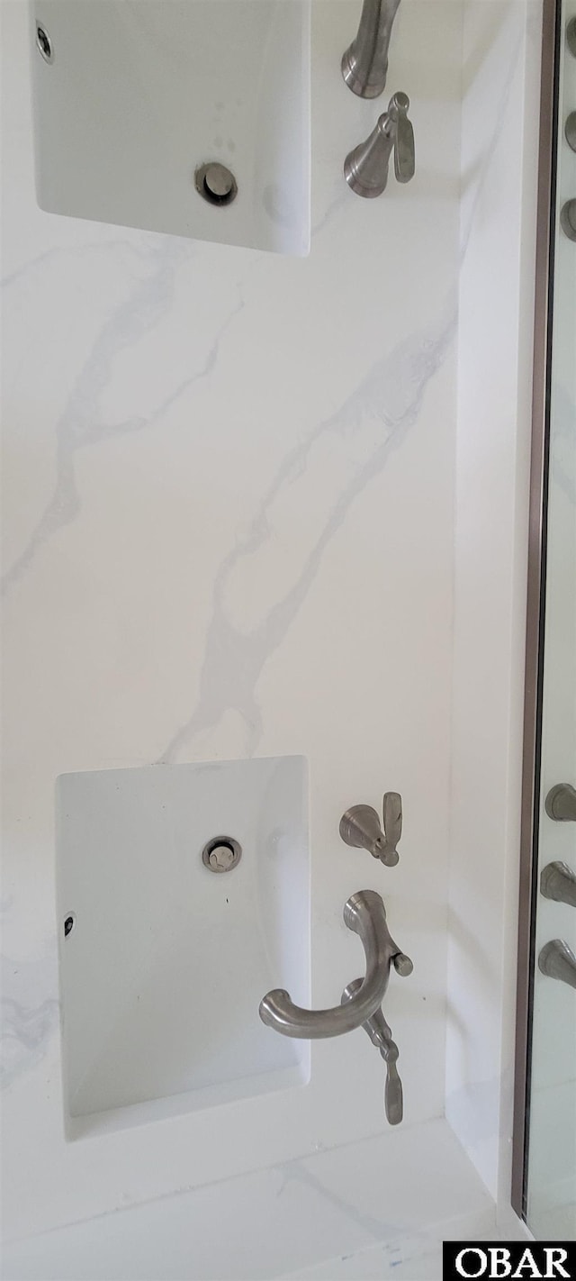interior details featuring walk in shower