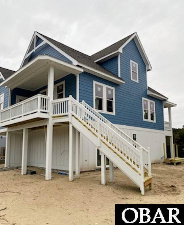 view of property exterior featuring stairway