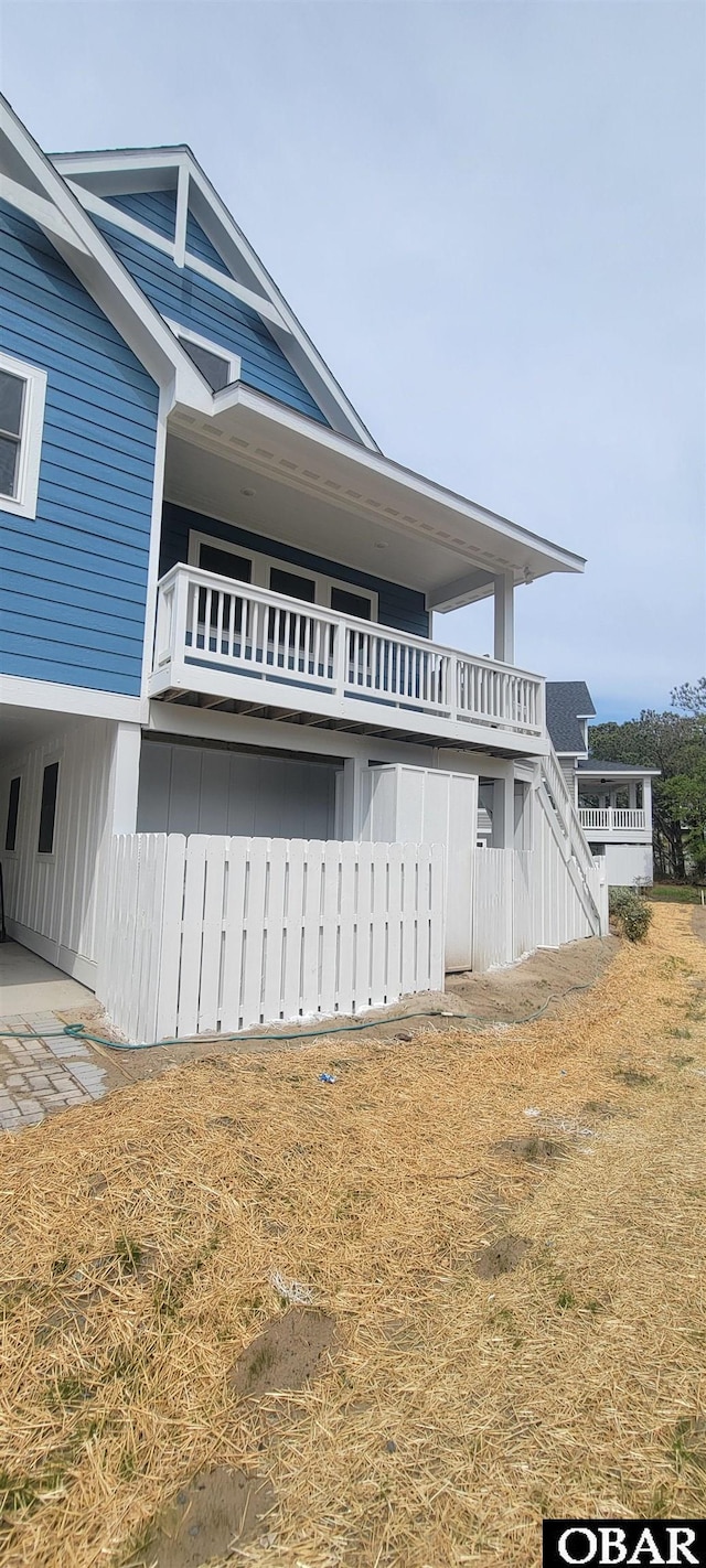 view of home's exterior featuring stairway
